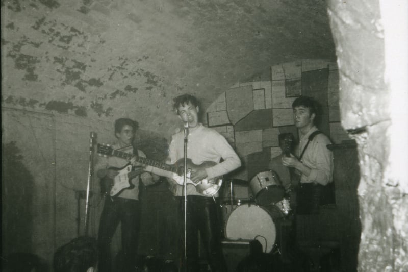 Rare photograph of The Beatles, with Pete Best on drums, playing at the Cavern Club in Liverpool in July 1961 - over a year before the band released their debut single Love Me Do.