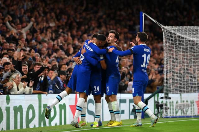 Pierre-Emerick Aubameyang of Chelsea celebrates with team mates after scoring their sides second (Photo by Mike Hewitt/Getty Images)