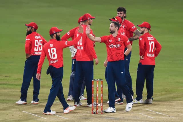 England celebrate after wicket in seventh and final T20 in Pakistan last month