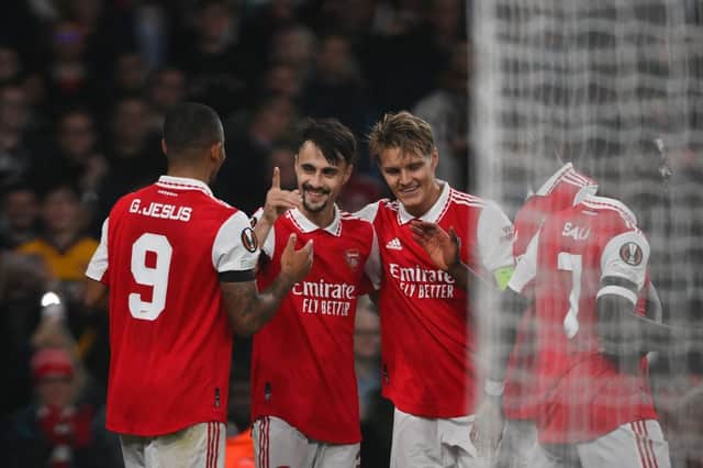 Arsenal’s Portuguese midfielder Fabio Vieira (2nd L) celebrates with teammates after scoring his team third goal (Photo by DANIEL LEAL/AFP via Getty Images)