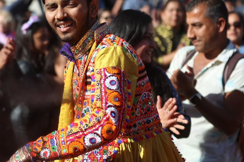 Both men and women were dressed in colourful costumes.