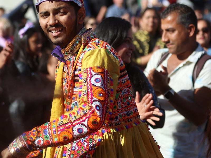 Both men and women were dressed in colourful costumes.