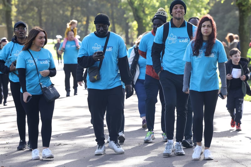 Walkers taking part in the event for the Alzheimer’s Society at Heaton Park. Photo: Gareth Jones