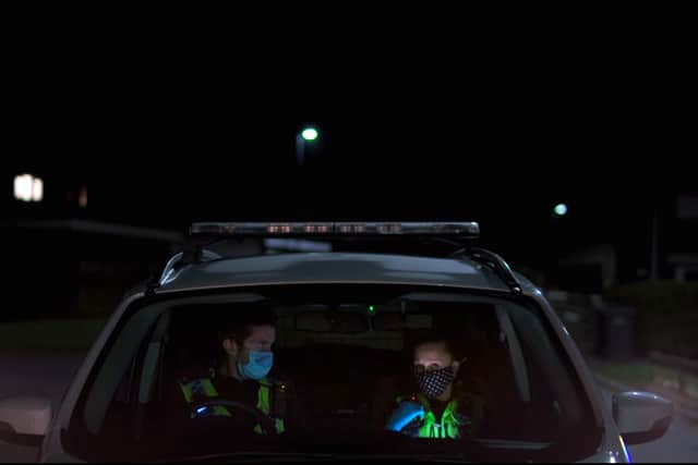 Reported Missing S4,11-10-2022,1,South Yorkshire Police officers sitting in police car (Picture by BBC/Blast! Films)