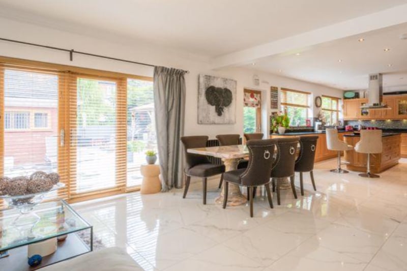 The whole open plan area features stunning marble flooring and is incredibly spacious. 