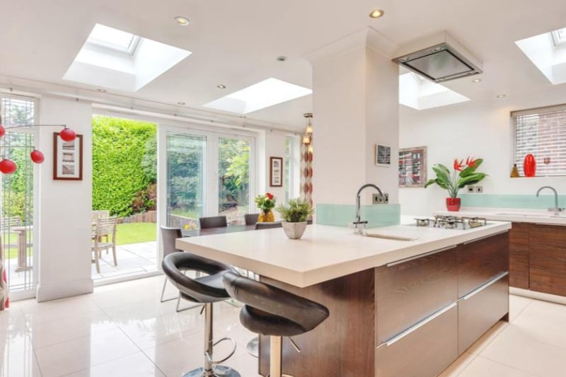 The kitchen/dinner is incredibly spacious, with modern fixtures and access to the large garden.