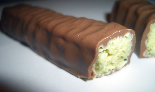 Milk chocolate on the outside and soft, flaky white goodness on the inside. Sadly missed.