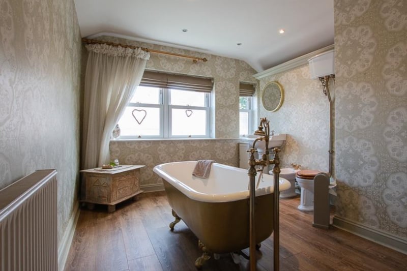 The stunning family bathroom even has a free standing claw bath tub.