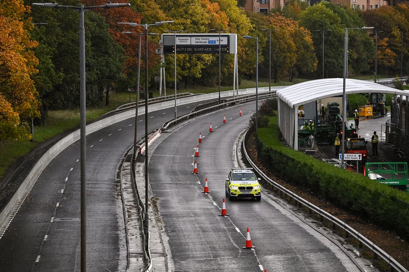 A police  lone vehicle on the A814 Clydeside Expressway following a road closure restriction ahead of COP26