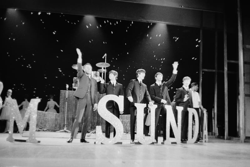 The Beatles and Bruce Forsyth wave farewell from the centre stage revolve at the end of the ‘Sunday Night at the London Palladium’ television variety programme