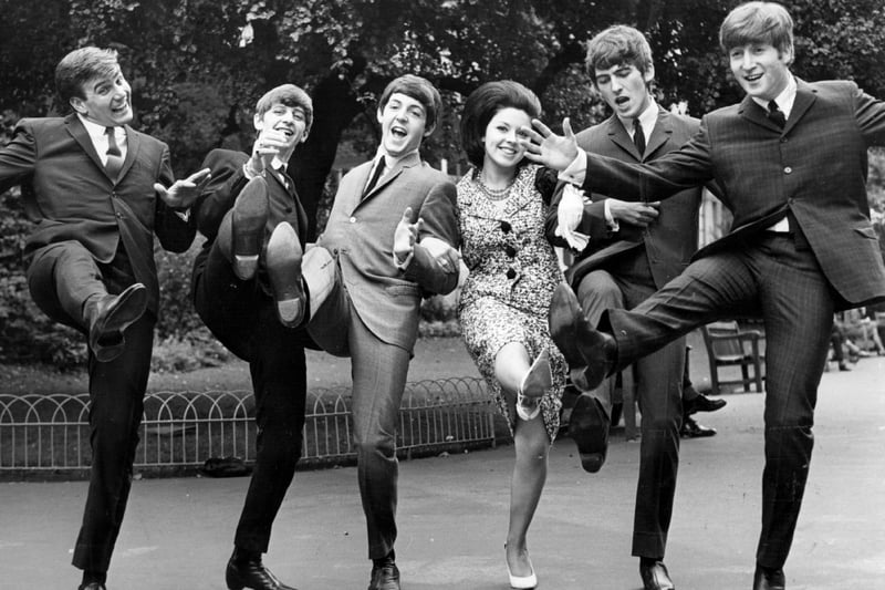 Winners of the Melody Maker poll awards for 1963, from left; Billy J Kramer, who won the ‘Best Hope For 1963’ award, The Beatles, who won ‘Top Vocal Group’ and, between Beatles Paul and George, Susan Maughan, who won the award for ‘Top Female Singer’.  September 11, 1963.