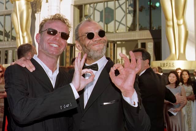 Actors Paul Barber (L) and Hugo Spear (R), both of "The Full Monty",  arrive for the 70th Annual Academy Awards 23 March in Los Angeles, Ca.    AFP PHOTO/Hector MATA (Photo credit should read HECTOR MATA/AFP via Getty Images)