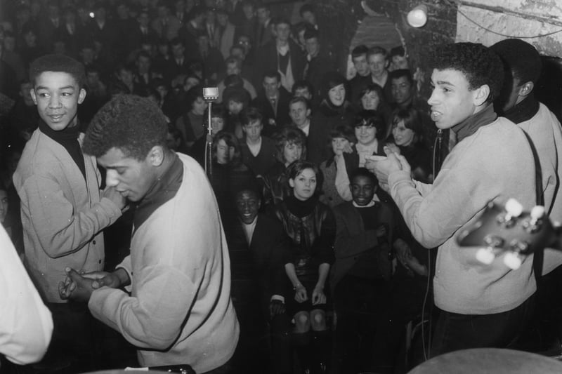 A view from the back of the stage of The Chants performing in 1964.