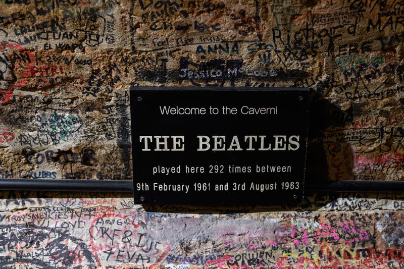 A plaque on the wall of the Cavern Club marks the number of times the British rock band The Beatles played in the venue.