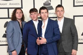  Musicians Nick O'Malley, Jamie Cook, Alex Turner, and Matt Helders of Arctic Monkeys attend The 57th Annual GRAMMY Awards at the STAPLES Center on February 8, 2015 in Los Angeles, California.  (Photo by Jason Merritt/Getty Images)