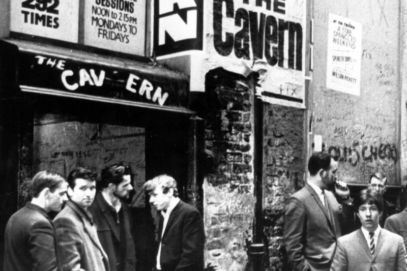 Music fans waiting outside the famous Cavern Club in 1966.