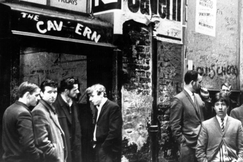 Music fans waiting outside the famous Cavern Club music venue in March 1966.