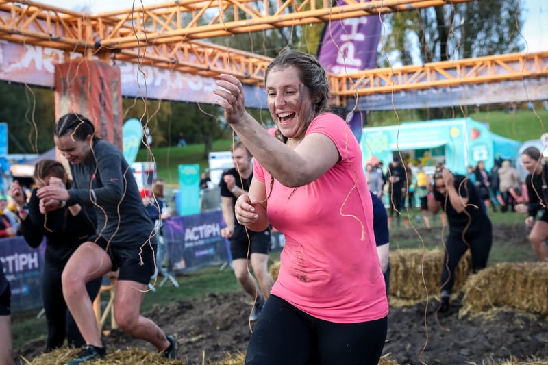 This obstacle is called Electroshock Therapy and involves a dash through 10,000 volts of electricity. Credit: Tough Mudder