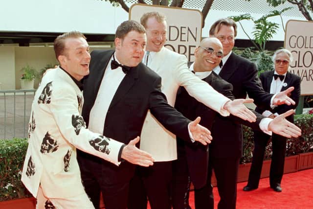 The cast of "The Full Monty" strikes a pose during their arrival for the 55th Annual Golden Globe Awards at the Beverly Hilton in Beverly Hills, CA,18 January. "The Full Monty" is nominated for Best Motion Picture in the Comedy or Musical category.  From L to R are: Hugo Spear, Mark Abbey, Steve Huison, Paul Barber and Tom Wilkerson.  (Photo credit should read HAL GARB/AFP via Getty Images)