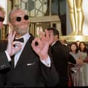 Actors Paul Barber (L) and Hugo Speer (R), both of "The Full Monty",  arrive for the 70th Annual Academy Awards 23 March in Los Angeles, Ca.    AFP PHOTO/Hector MATA (Photo by HECTOR MATA / AFP) (Photo by HECTOR MATA/AFP via Getty Images)