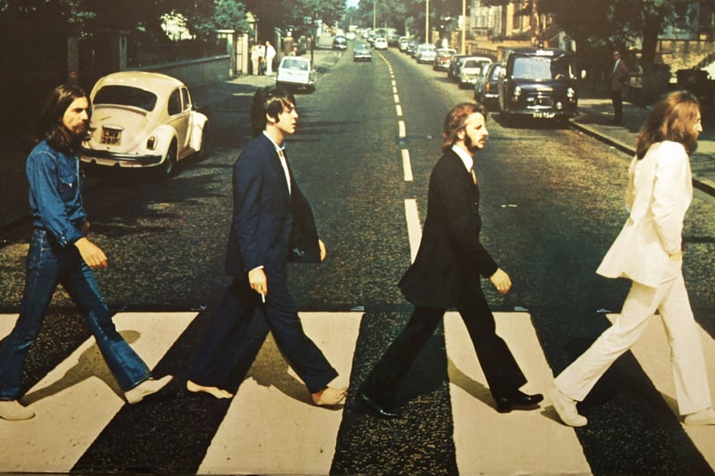 The Abbey Road photo taken in 1969 is one of the most famous photographs and was the cover photo for the band’s final album titled Abbey Road. It pictures the four members, George Harrison, Paul McCartney, Ringo Starr and John Lennon, striding along a zebra crossing on Abbey Road. The street in London is the location of EMI studios, where the band recorded their songs. 