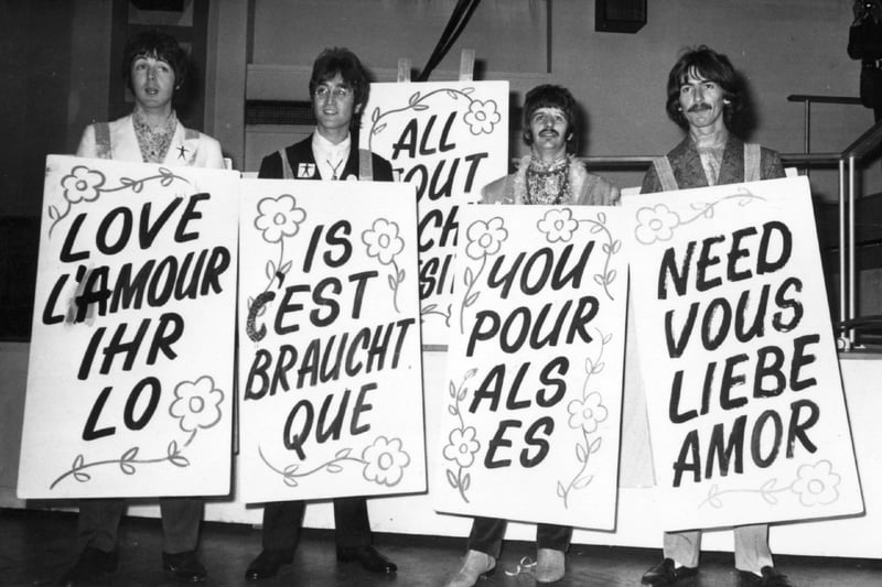 On 24 June 1967, The Beatles took this picture sporting multilingual ‘Love Is All You Need’ boards for their single “All You Need is Love” from their then-upcoming album “The Magical Mystery Tour.”