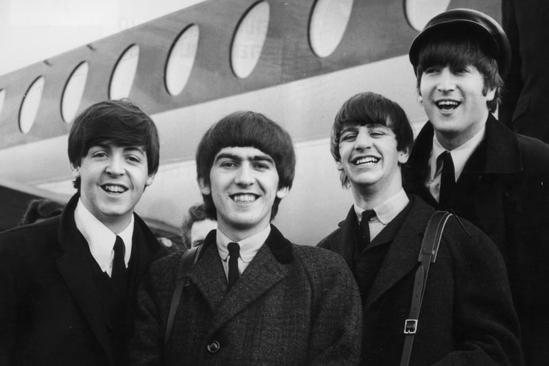 This photo taken on 6th February 1964 shows  The Beatles arriving at London Airport following a successful string of shows in Paris. 