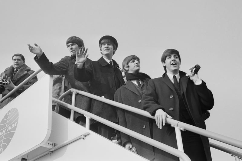 This iconic photo was snapped at London Airport, as the band were en route to America. 
