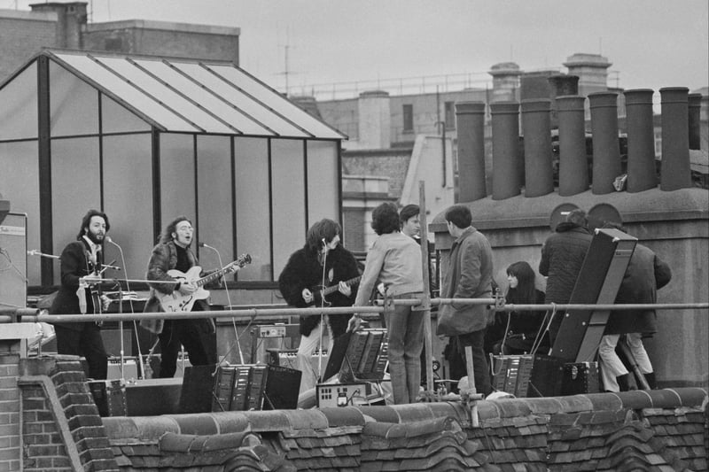 In this image from 30th January 1969, The Beatles can be seen performing their last live public concert on the rooftop of the Apple Organization building. The performance was for director Michael Lindsey-Hogg’s film documentary, ‘Let It Be.’