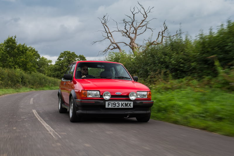 The Supersport is technically the first sporty Fiesta but it’s the XR2 that cemented the idea of a hot hatch version of Ford’s supermini. The first generation was powered by a 84bhp 1.6-litre and, with lower stiffer suspension, body kit and unique pepperpot alloys, it was the first Fiesta to reach 100mph. The pictured second-gen upped the ante with a 1.6-litre CVH engine producing 96bhp, giving it a top speed of 112mph.