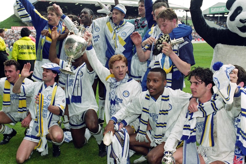 The First Division champions celebrate their victory with the Elland Road faithful. 