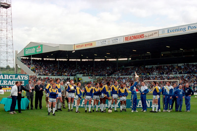 After a 1-0 final-day victory over Norwich City, the Whites become the last team to lift the First Division trophy in front of a rapturous Elland Road crowd.