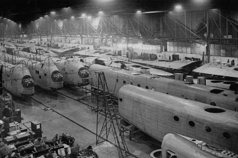 The fuselage and wing components for the Short Stirling four-engine heavy bomber being assembled for service with Royal Air Force Bomber Command at the Short Brothers aircraft assembly plant on 9th February 1942 in Longbridge, Birmingham. The Short Stirling was the first four-engined bomber to be introduced into service with the Royal Air Force (RAF).