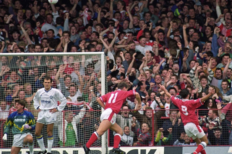 Middlesborough celebrate one of their four goals as the defending First Division champions fall to a heavy defeat at Ayresome Park in  August 1992.
