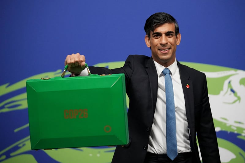 Then Chancellor of the Exchequer, Rishi Sunak, arrives at COP26 with his Green Budget Box to lead Finance Day.