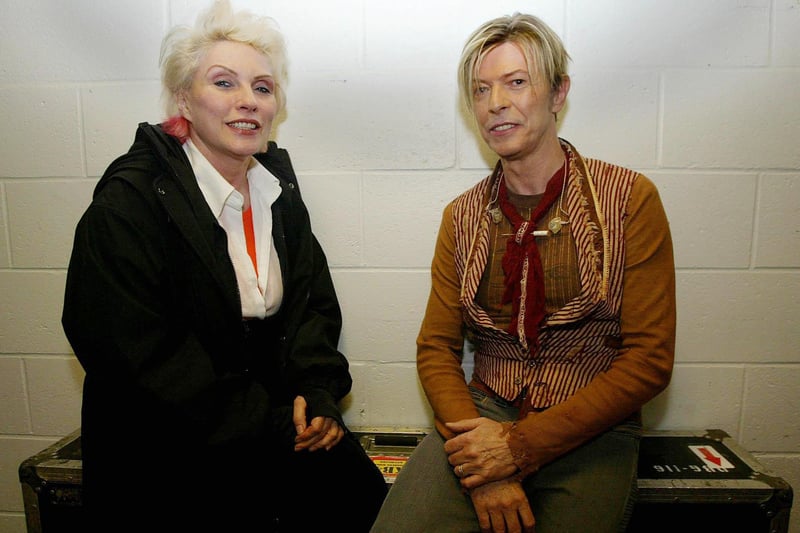 Blondie’s Debbie Harry with British cultural icon David Bowie before his concert at the MEN Arena (now AO Arena) in 2003. (Photo: IAN HODGSON/AFP via Getty Images)
