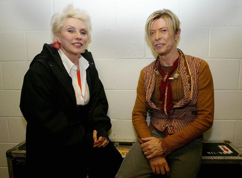 Blondie’s Debbie Harry with British cultural icon David Bowie before his concert at the MEN Arena (now AO Arena) in 2003. (Photo: IAN HODGSON/AFP via Getty Images)
