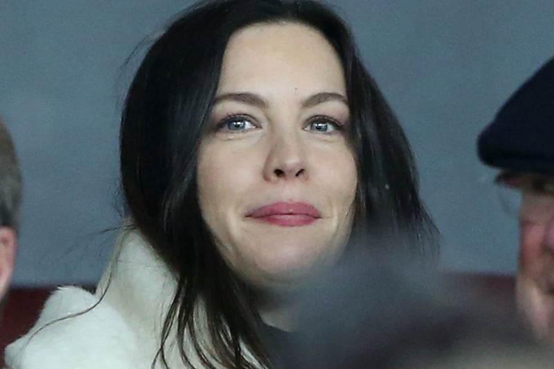 Actress Liv Tyler watching the Emirates FA Cup Quarter Final match between Manchester United and Brighton & Hove Albion at Old Trafford  in 2018 (Photo by Matthew Peters/Manchester United via Getty Images)