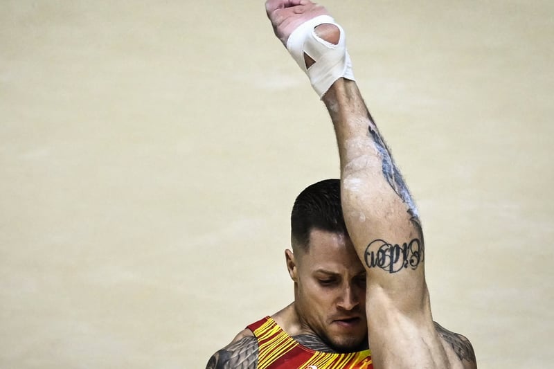 Spain’s Nestor Abad competes during the Men’s Floor Exercise qualification event. (Photo by BEN STANSALL/AFP via Getty Images)