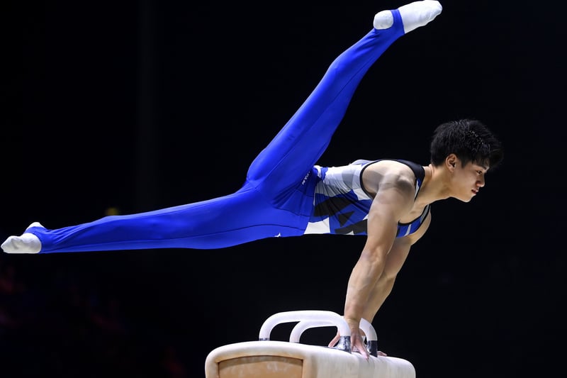 Daiki Hashimoto of Team Japan competes on Pommel Horse. (Photo by Laurence Griffiths/Getty Images)