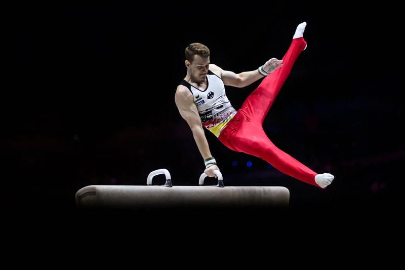 Germany’s Nils Dunkel competes during the Men’s Pommel Horse. (Photo by BEN STANSALL/AFP via Getty Images)