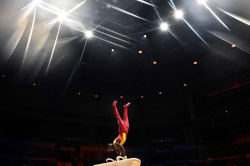 Belgium’s Noah Kuavita competes during the Men’s Pommel Horse. (Photo by BEN STANSALL/AFP via Getty Images)