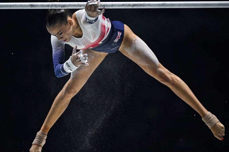 Britain’s Georgia Mae Fenton competes during the Women’s Uneven Bars team final event. (Photo by BEN STANSALL/AFP via Getty Images)