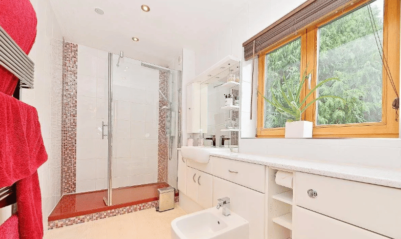 The master bedroom has a spacious ensuite fitted with a large walk-in shower enclosure, WC, bidet and wash basin. (Credit - Zoopla)