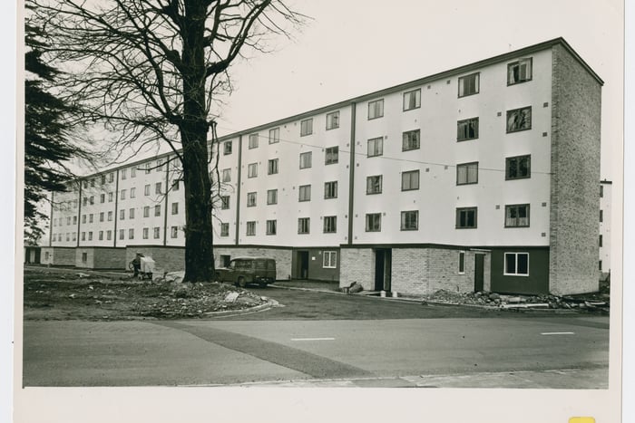 This image shows the largest block at Henbury Court, shortly after completion in 1957. The building contained 30 flats on five floors. It was built on the site of the former Henbury Court Hotel. The finishing touches can be seen still being made to the flats despite residents already moving into the building. The small utility blocks seen have since been removed.