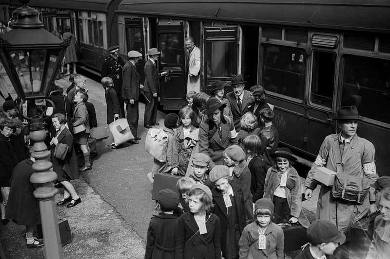  A trainload of schoolchildren with labels round their necks arrive at Pontypool, Monmouthshire railway station from Birmingham. They are the first evacuees to arrive in Wales in the days leading up to WW II. 