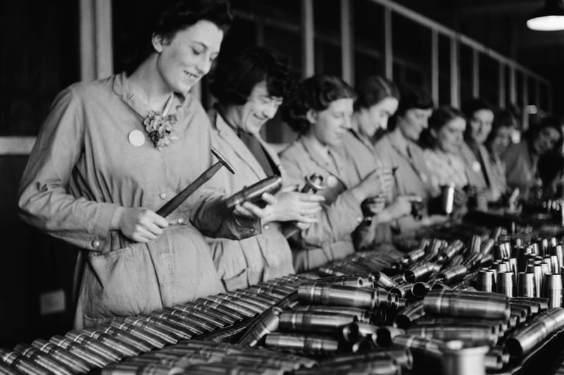 Women working in a munitions factory in Birmingham, England, during World War II, August 1941. From a Ministry of Information special on Birmingham. (Photo by Fred Ramage/Keystone Features/Hulton Archive/Getty Images)