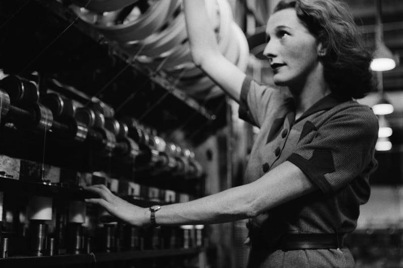 A woman working in a factory in Birmingham, England, during World War II, August 1941. From a Ministry of Information special on Birmingham. (Photo by Fred Ramage/Keystone Features/Hulton Archive/Getty Images)
