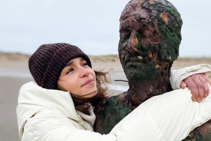 Game of Thrones star, Emilia Clarke, shared a snap of herself on Crosby Beach, in February 2022. Image: Emilia Clarke via Instagram.