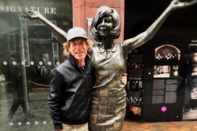 Mick Jagger went sightseeing ahead of The Rolling Stones’ Liverpool gig in June 2022. He shared this snap of himself and Cilla Black’s tribute statue on Twitter. Image: Mick Jagger via Twitter. 